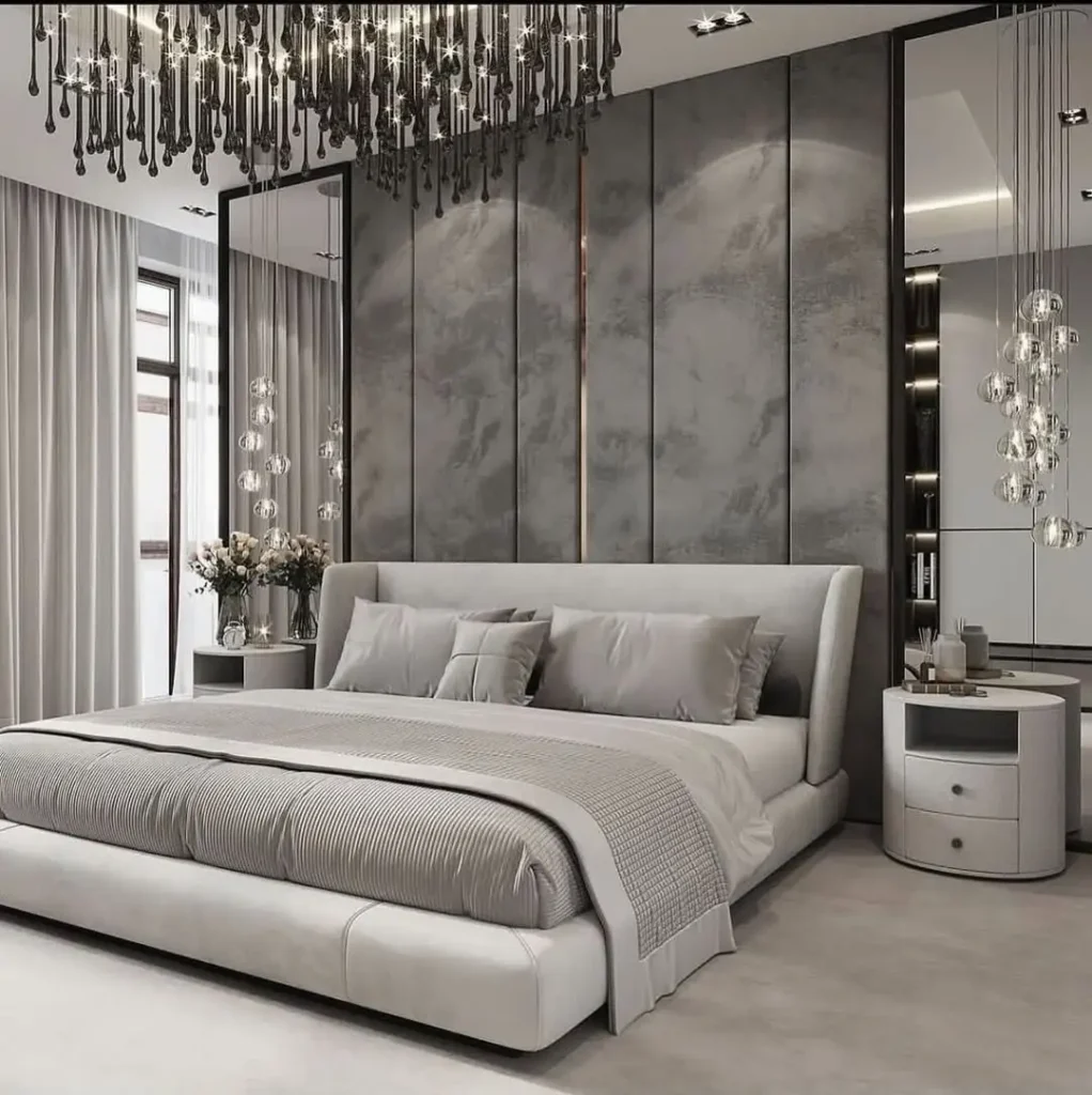 Modern luxury bedroom with curved headboard design and soft lighting