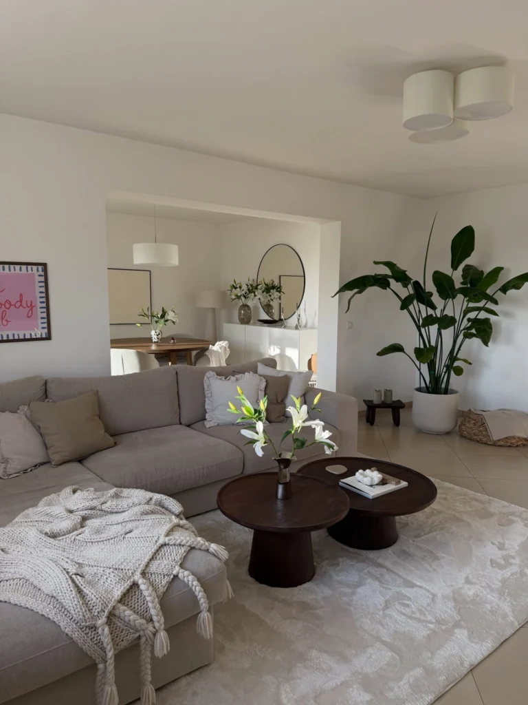 Living room with undersized wall art above sofa