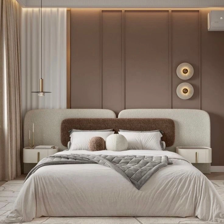 Elegant modern bedroom with floral accent wallpaper and soft lighting