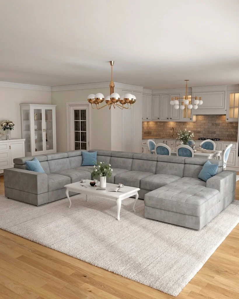 12 Elegant Living Room Decor Ideas for a Modern Home 10 Open-plan living room and dining area with neutral sofas and modern chandelier