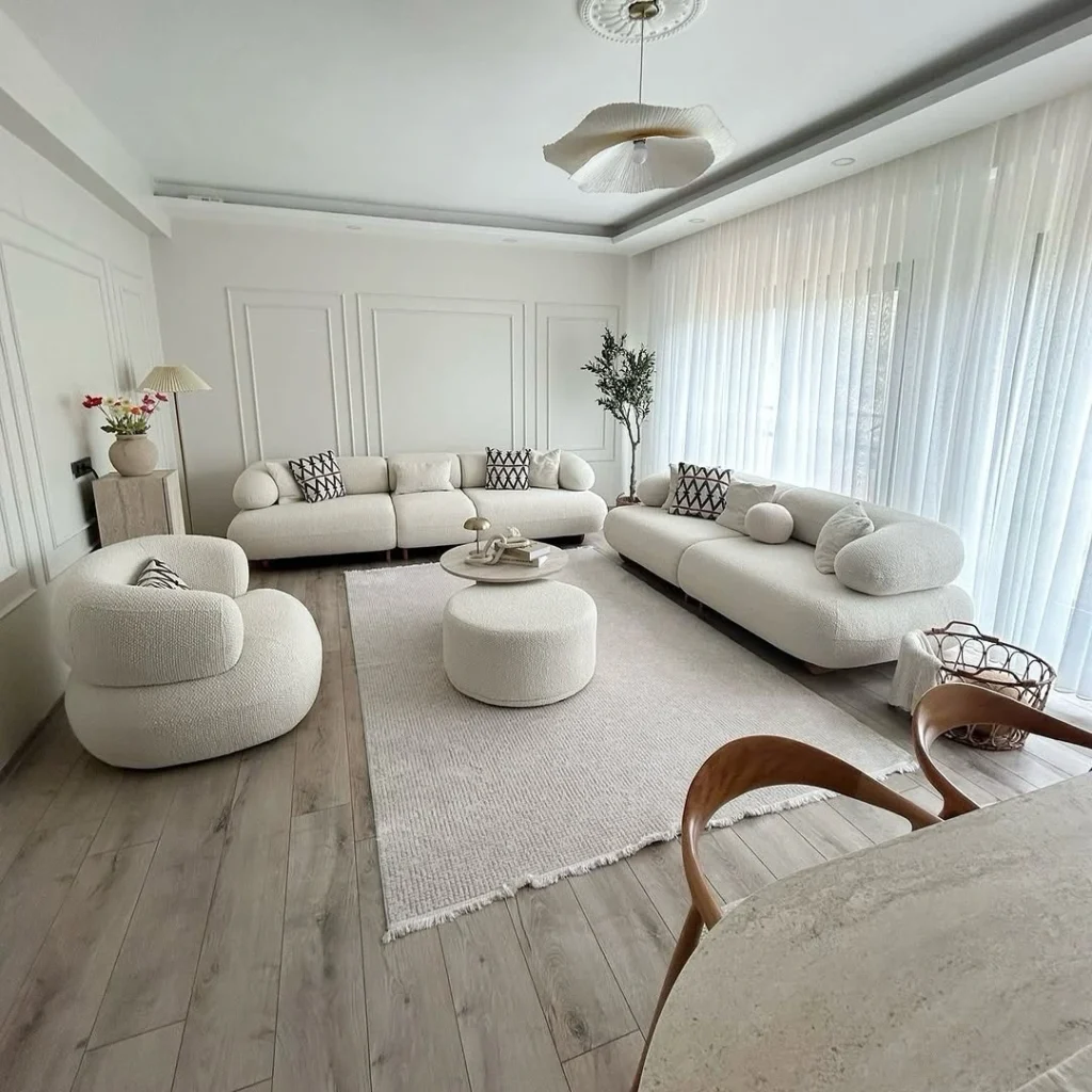 Luxury Living Room Design Ideas: Creating a Modern Elegant Space 3 minimalist luxury living room with curved sofas and textured white rug