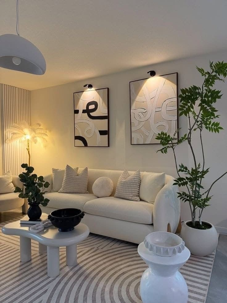 Cozy neutral living room with beige sofa, layered textures, wooden coffee tables, and indoor plants