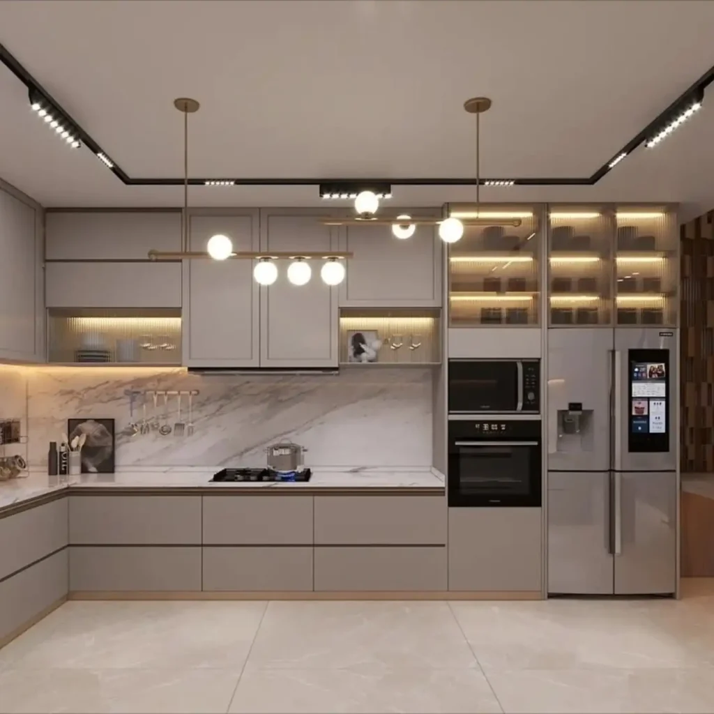 Elegant Modern Kitchen Design Ideas for a Stylish Home 11 Spacious modern kitchen with grey cabinetry, marble walls, and built-in storage