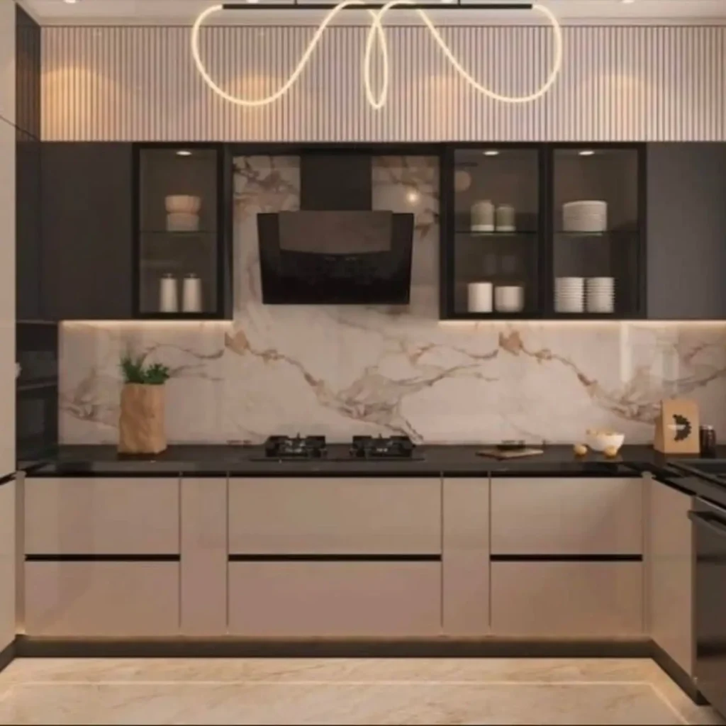 Elegant Modern Kitchen Design Ideas for a Stylish Home 19 Modern kitchen with marble backsplash, statement range hood, and warm lighting