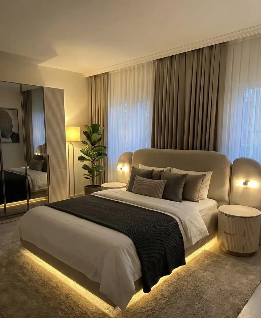 11 Luxurious Modern Bedroom Ideas That Feel Calm, Cozy & Elegant 11 soft neutral bedroom with gold abstract wall art and chandelier