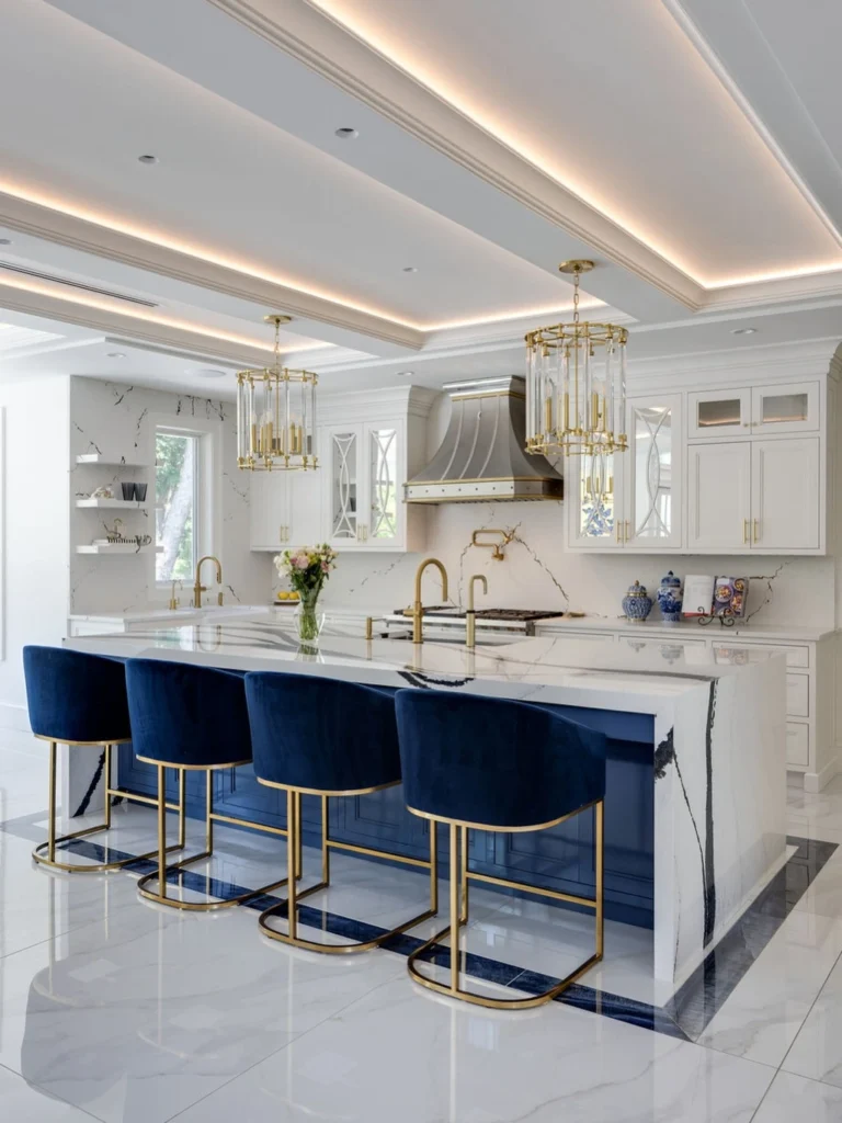 Luxury white kitchen with marble island and gold accents