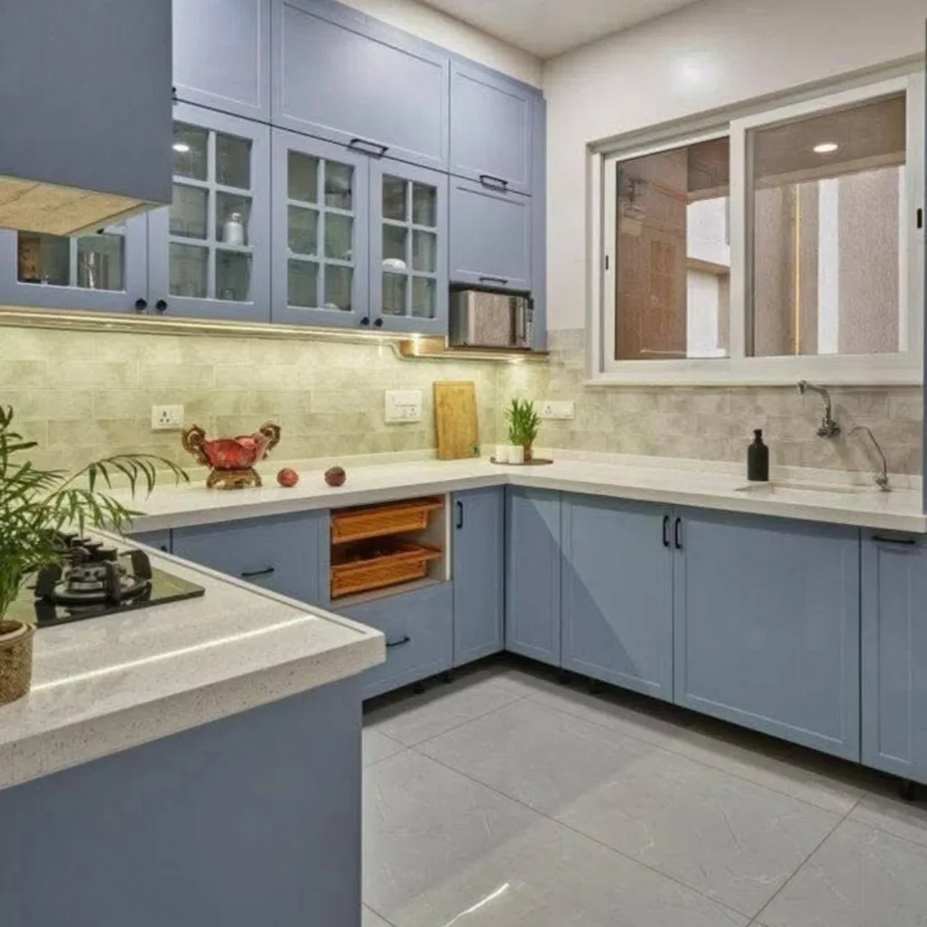 Modern kitchen with soft blue cabinets and clean layout