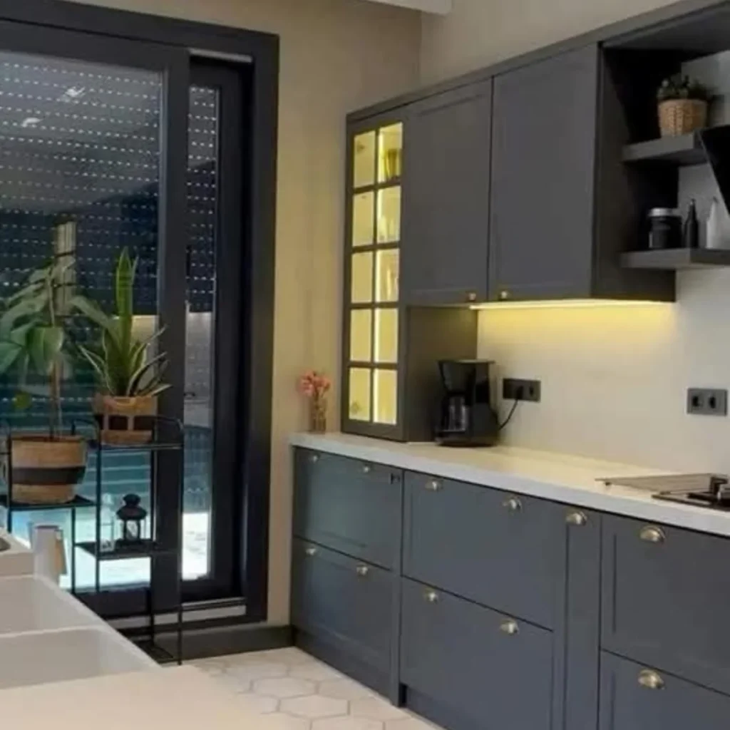 Minimal grey modern kitchen with soft lighting