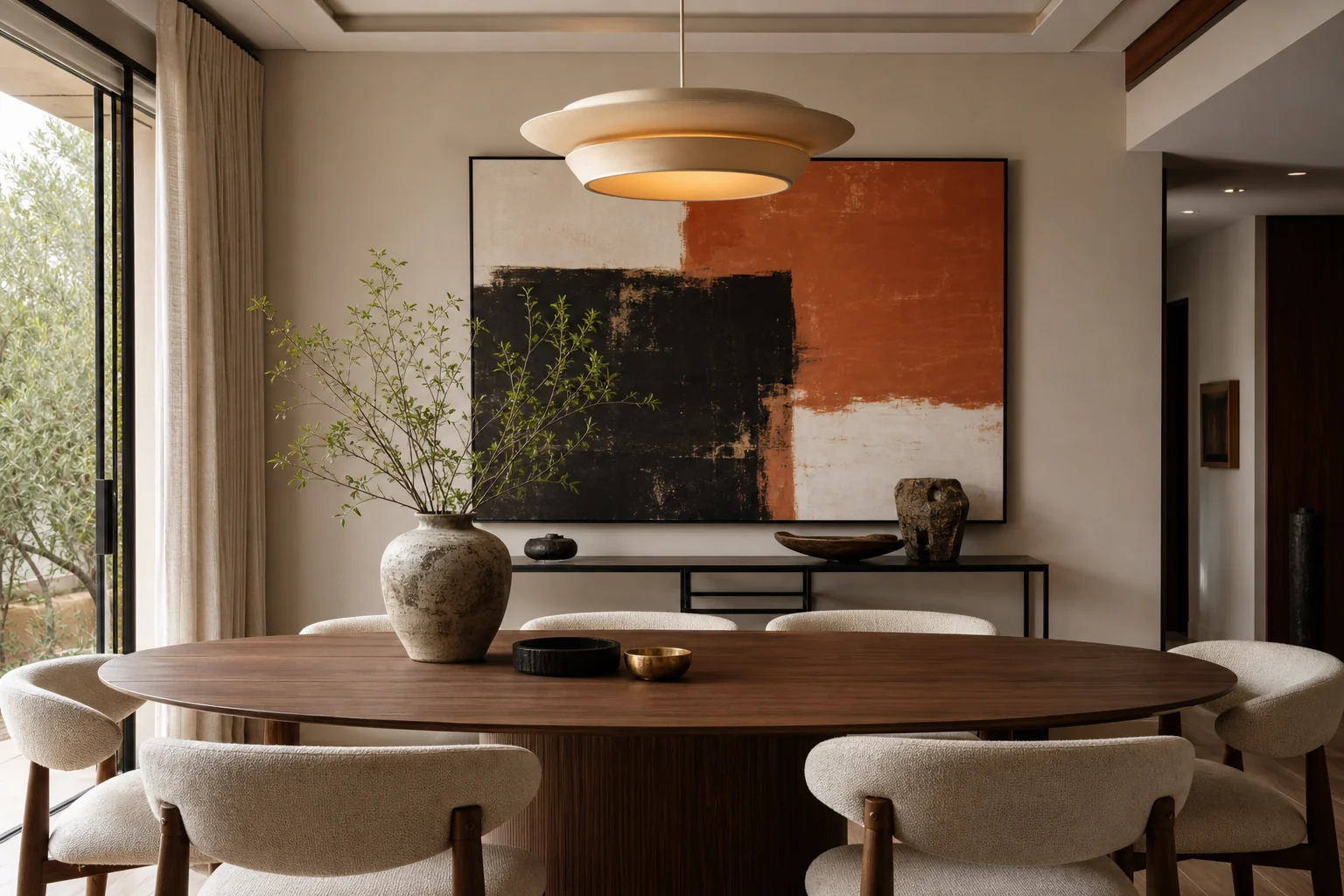 Large abstract dining room wall art above a slim console